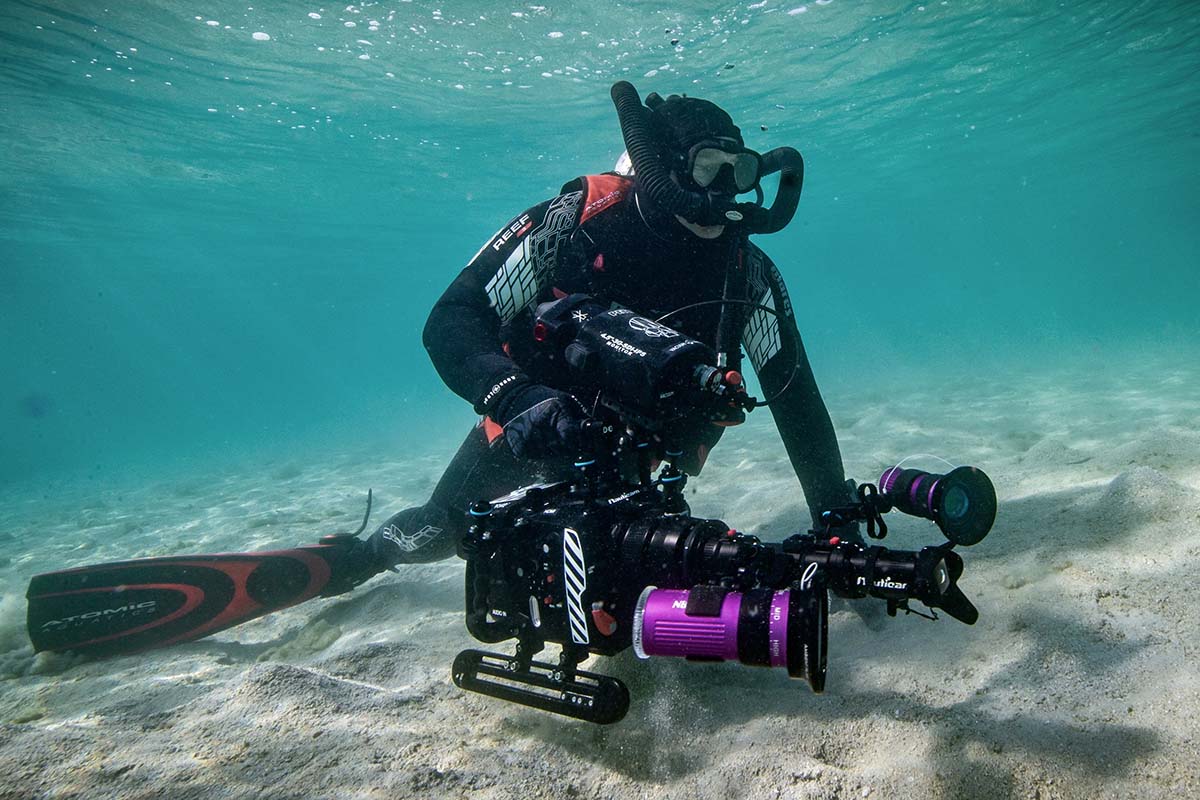 Pete West underwater holding camera