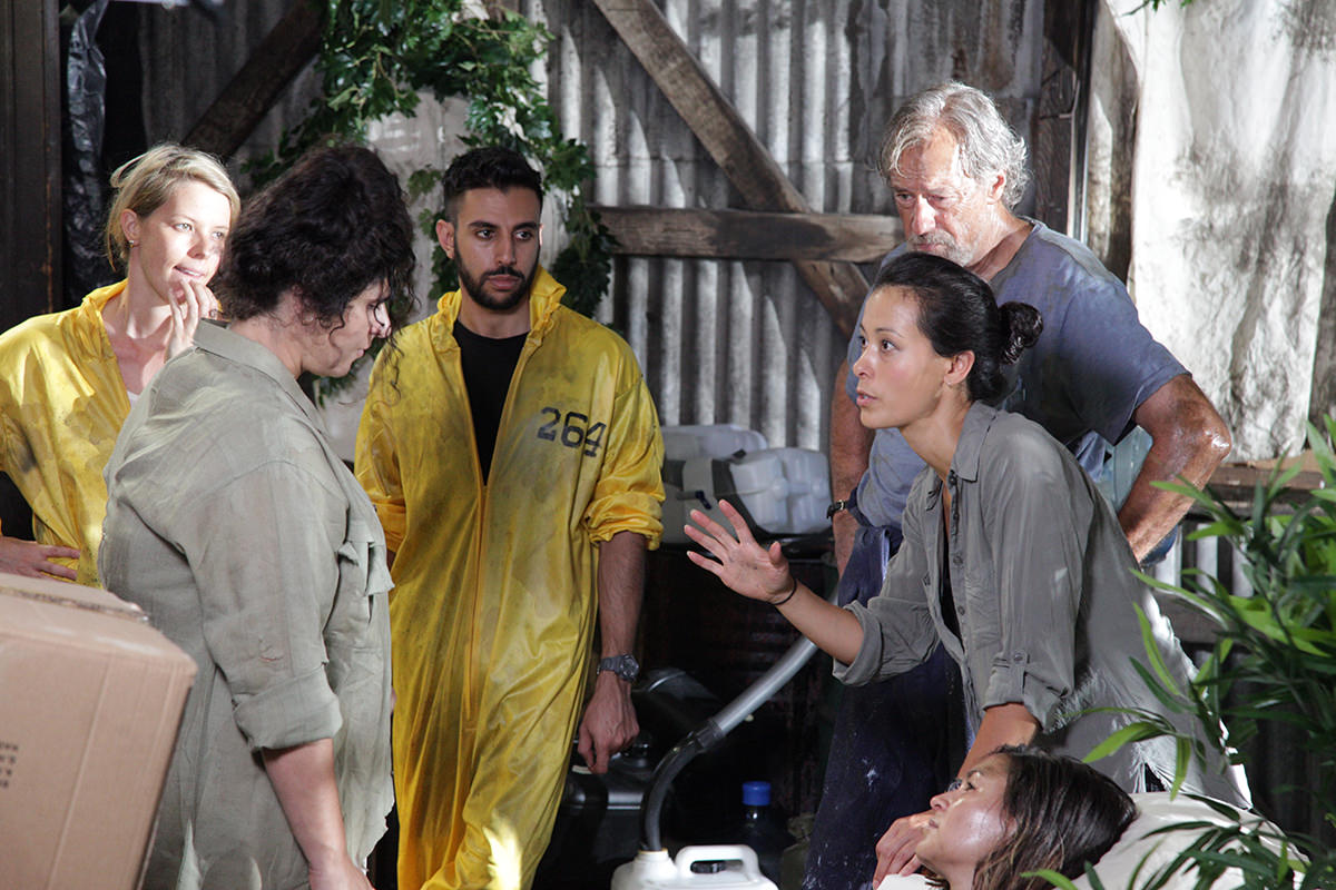 Director Rosie Lourde talks to the actors on the set of Breach