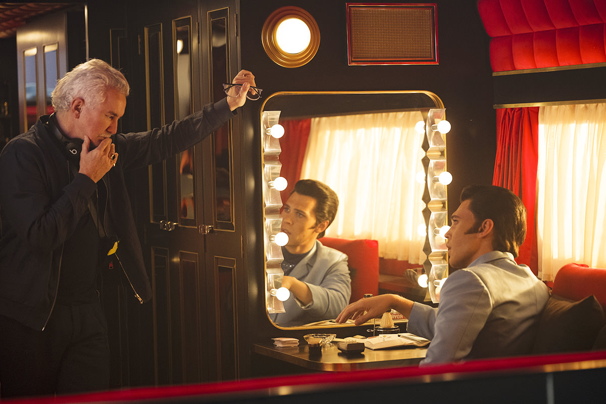 Director/writer/producer Baz Luhrmann and Austin Butler on the set of Warner Bros. Pictures’ drama Elvis