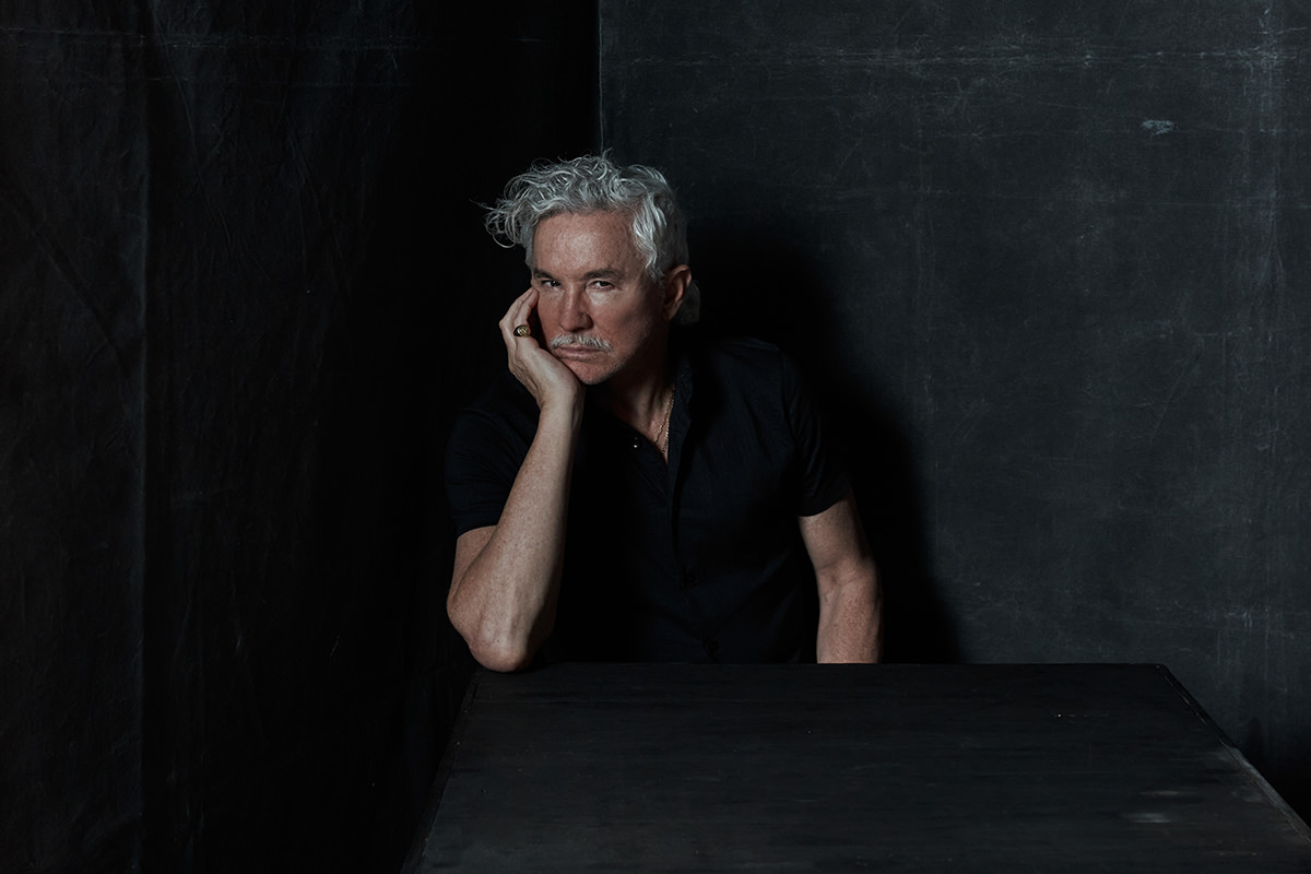 Headshot of Baz Luhrmann.