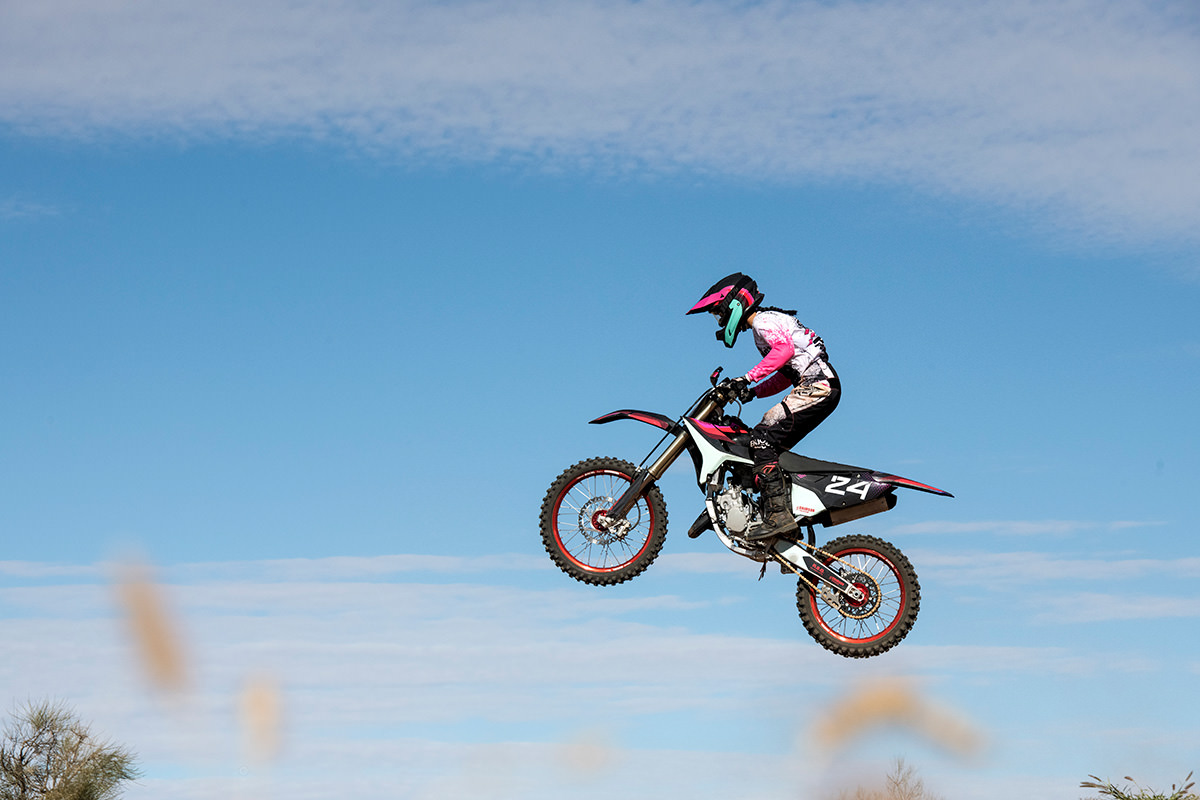 Motocross rider on bike.